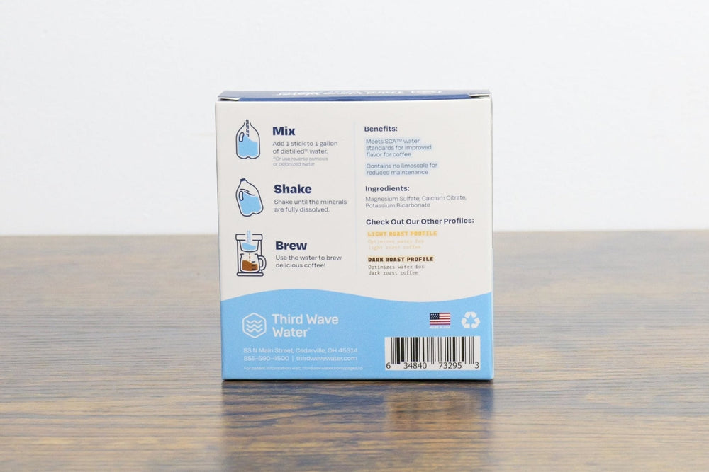 Box of Third Wave Water on a wooden surface with a white background